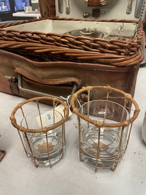 Lot 356 - An early 20th C Coracle picnic set.
