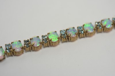 Lot 260 - An opal and blue stone bracelet