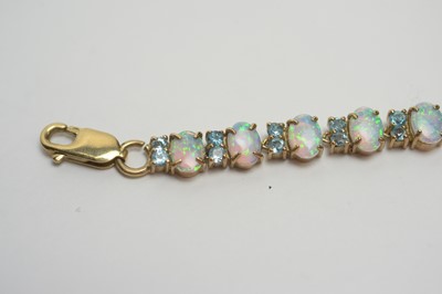 Lot 260 - An opal and blue stone bracelet