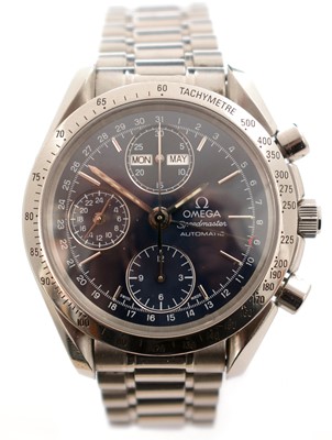 Lot 352 - Omega Speedmaster Automatic: a triple calendar steel cased wristwatch