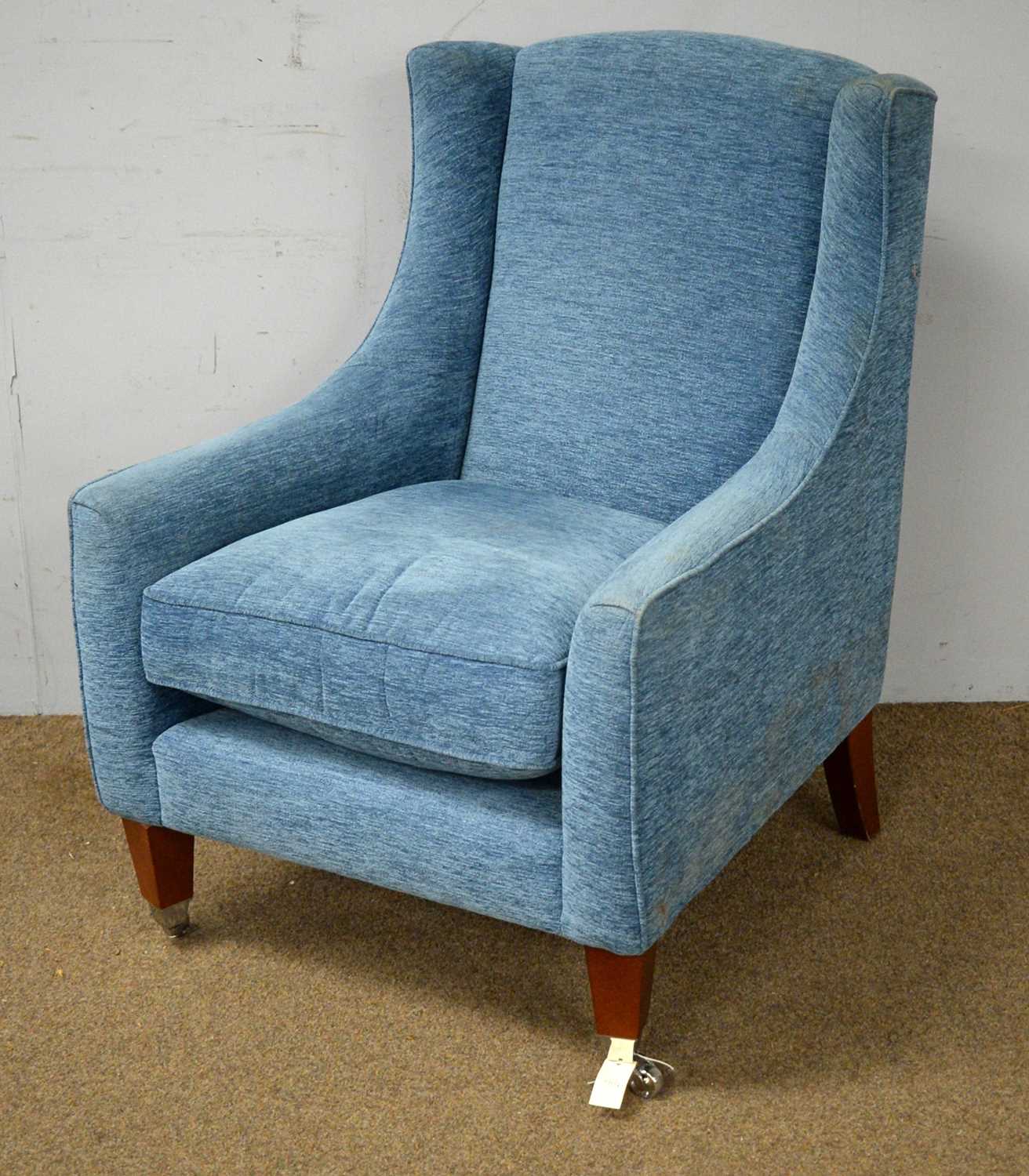 Lot 28 - A Parker Knoll wingback armchair