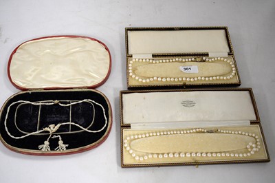 Lot 301 - A selection of pearl necklaces.