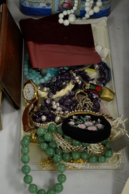Lot 302 - A selection of costume jewellery and watches.