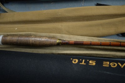 Lot 513 - A selection of fishing rods and reels.