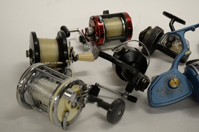 Lot 513 - A selection of fishing rods and reels.
