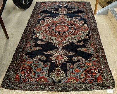 Lot 113 - A Caucasian small indigo ground rug.