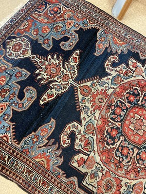 Lot 113 - A Caucasian small indigo ground rug.