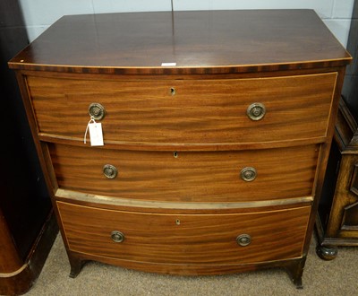 Lot 95 - An early 20th Century mahogany bow front chest of drawers.