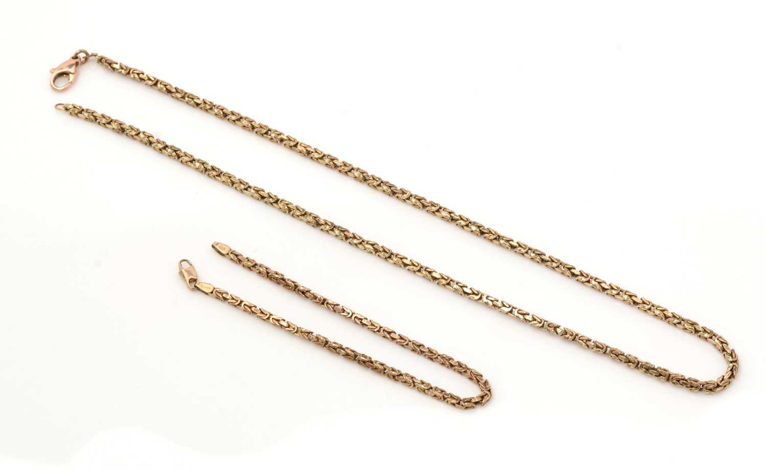 Lot 473 - A 9ct yellow gold necklace and bracelet