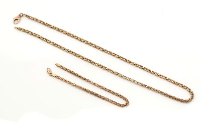 Lot 473 - A 9ct yellow gold necklace and bracelet