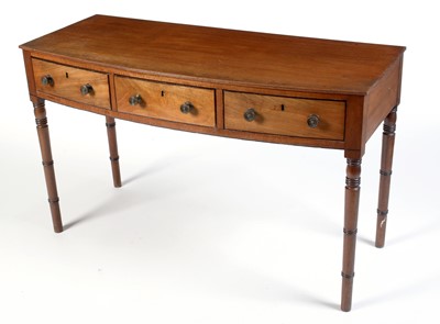 Lot 1035 - A Georgian mahogany bowfront side/serving table