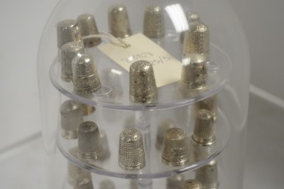 Lot 293 - A collection of silver thimbles.