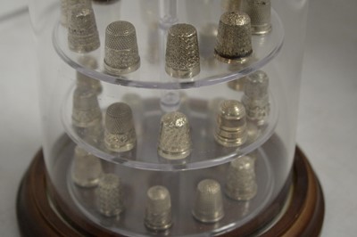 Lot 293 - A collection of silver thimbles.