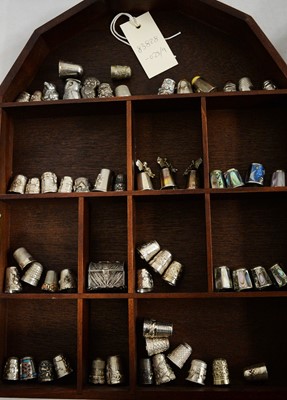 Lot 305 - A selection of silver and other thimbles.