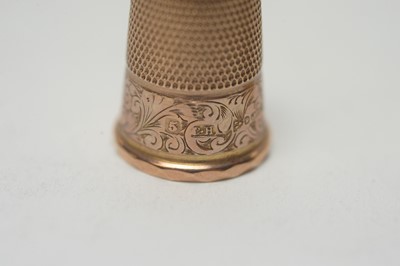 Lot 294 - Two 9ct gold thimbles.