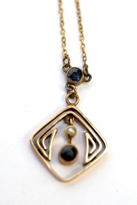 Lot 159 - A sapphire and seed pearl pendant; and a signet ring
