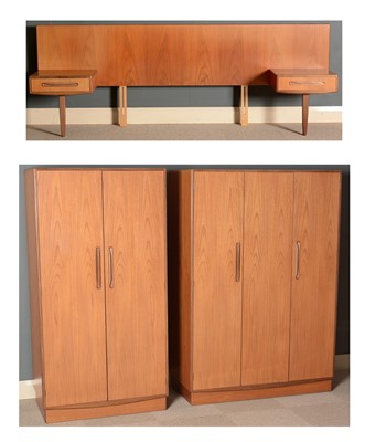 Lot 421 - G-Plan: two teak wardrobes; and a double headboard.