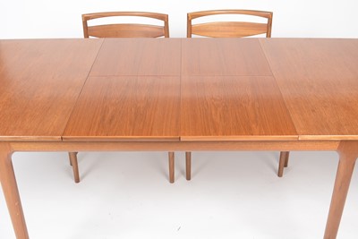 Lot 385 - A. H. McIntosh & Co. Ltd, Kirkcaldy: a mid Century teak extending dining table and six chairs.