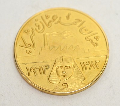 Lot 201 - An Egyptian yellow metal medallion