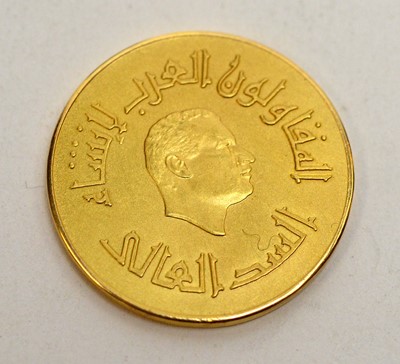 Lot 201 - An Egyptian yellow metal medallion