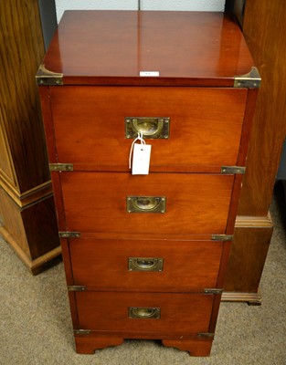 Lot 84 - A 20th Century teak and brass bound campaign style chest.