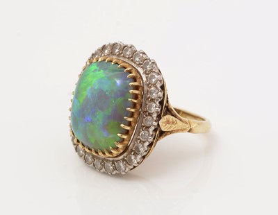 Lot 481 - A black opal and diamond cluster ring