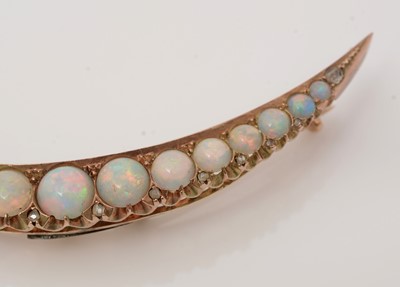 Lot 485 - A Victorian opal and diamond crescent brooch