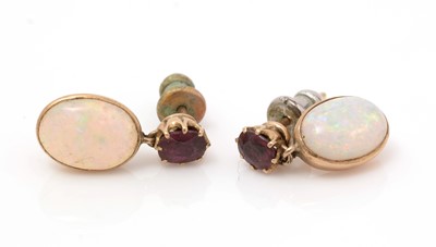 Lot 487 - A pair of ruby and opal drop earrings