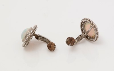 Lot 490 - A pair of late Victorian opal and diamond cluster earrings