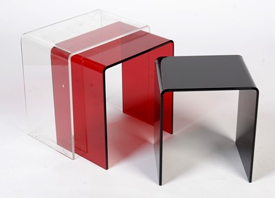 Lot 404 - A contemporary nest of perspex occasional tables