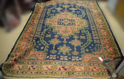 Lot 107 - A Turkish carpet