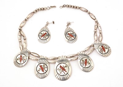 Lot 882 - Charles Mike Yazzie, Native American: a silver necklace and earrings