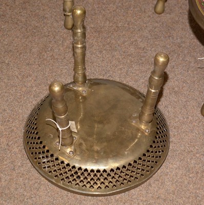 Lot 33 - A set of six Indian enamelled brass three legged stools.