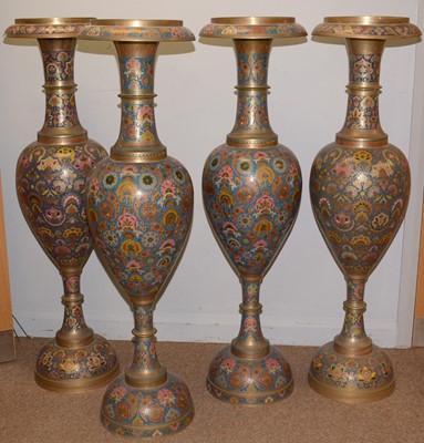 Lot 11 - A selection of four Indian enamelled brass floor standing urns.