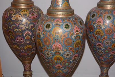 Lot 11 - A selection of four Indian enamelled brass floor standing urns.