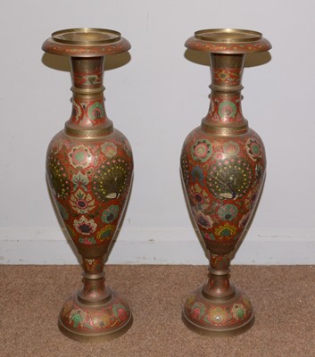 Lot 10 - A pair of Indian enamelled brass floor standing urns.
