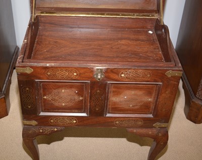 Lot 96 - An Indian hardwood dome topped chest.
