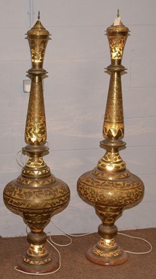 Lot 41 - A pair of Indian pierced brass floor standing lamps.
