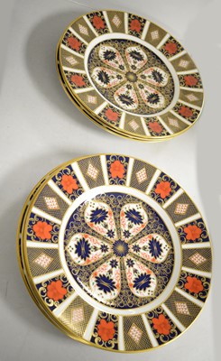 Lot 479 - Set of six Royal Crown Derby Amari pattern circular dinner plates