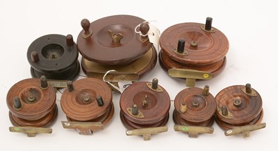 Lot 975 - A selection of mahogany and brass reels