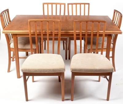Lot 374 - A. H. McIntosh & Co., Ltd, of Kirkcaldy: a teak extending dining table and six associated chairs