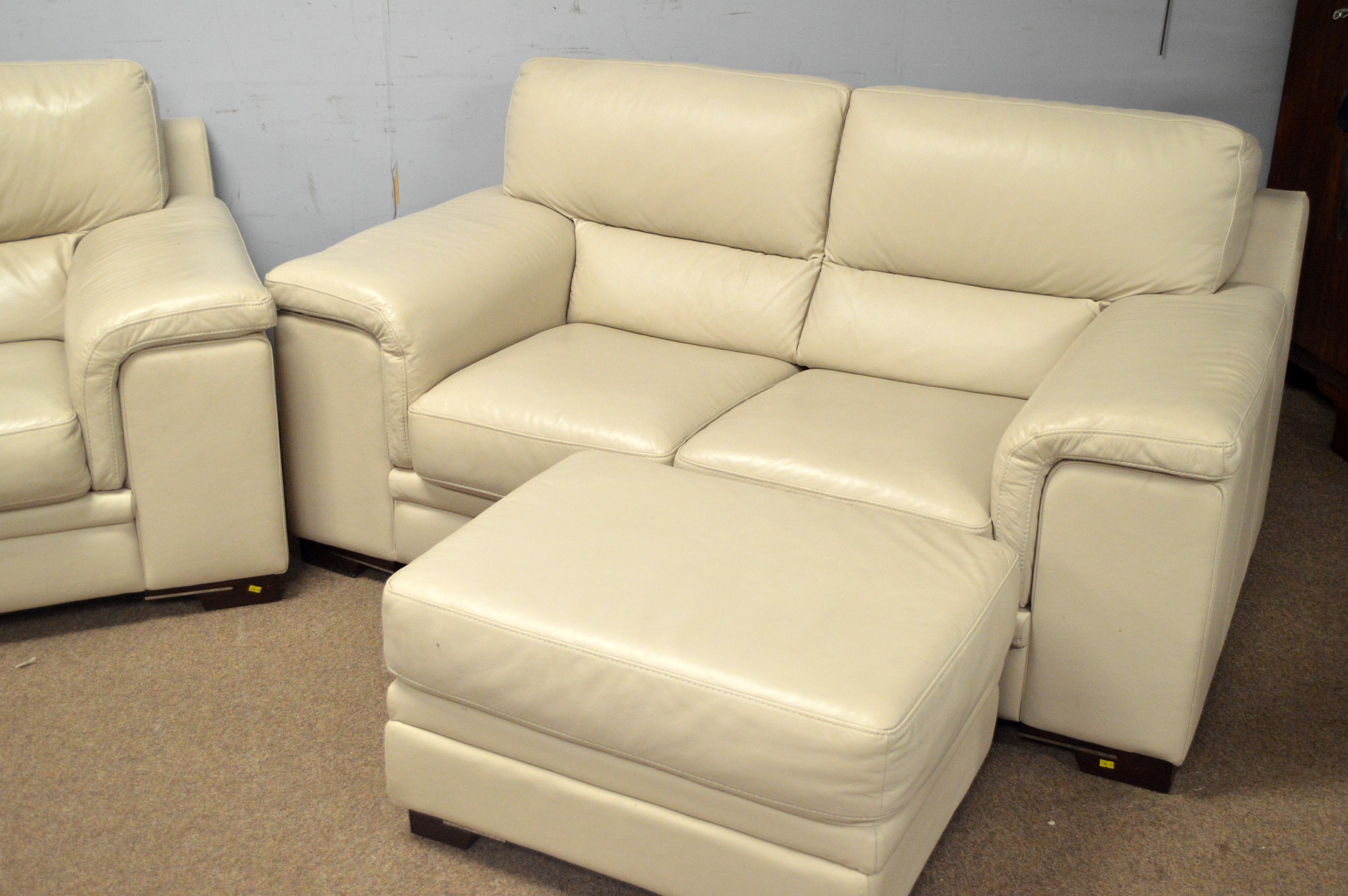 Lot 57 A modern leather three piece suite