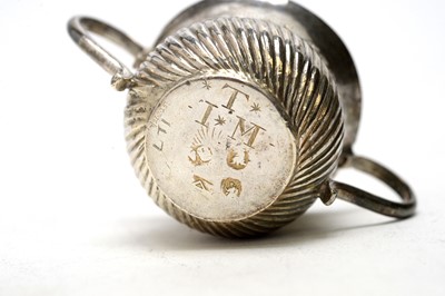 Lot 565 - A Queen Anne silver miniature porringer, by Thomas Bamford