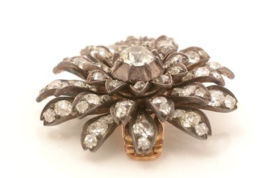 Lot 403 - A Victorian diamond flowerhead brooch