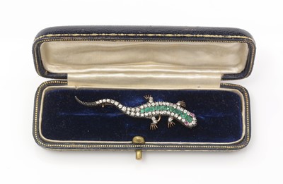 Lot 409 - A Victorian emerald, ruby and diamond lizard pattern brooch