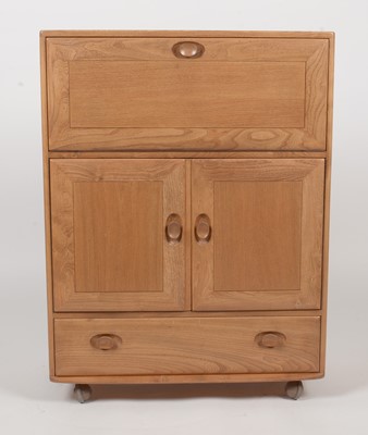 Lot 324 - Ercol: an elm Winsor No. 430 serving cabinet