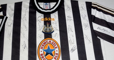 Lot 1186 - A Newcastle United replica football shirt, signed.