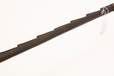 Lot 959 - Two fishing spears and a tribal stick