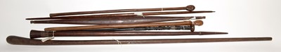 Lot 960 - A selection of African sticks, throwing sticks and clubs