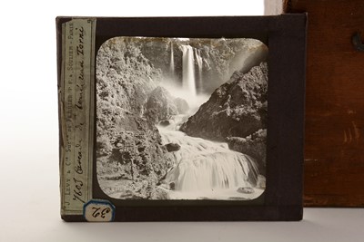 Lot 798 - A collection of magic lantern slides, and a lantern
